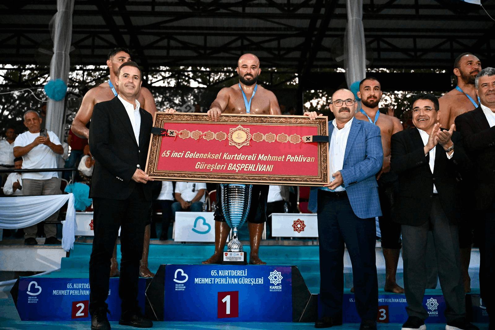 65-geleneksel-kurtdereli-mehmet-pehlivan-yagli-gureslerinin-baspehlivani-orhan-okulu